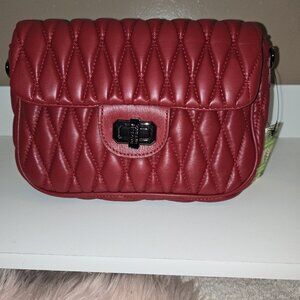 Badgley Mischka oblong quilting crossbody, letter lock opening